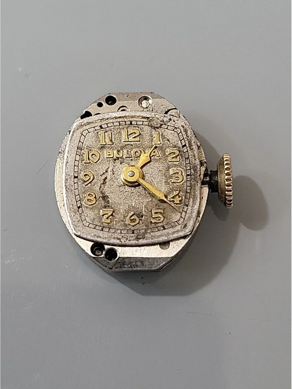 Bulova Swiss watch movement 12.8mm x 15.4 For Parts Or Repairs As Is L74